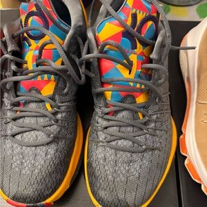 Nike Gray and Yellow Athletic Shoes with Textured Design